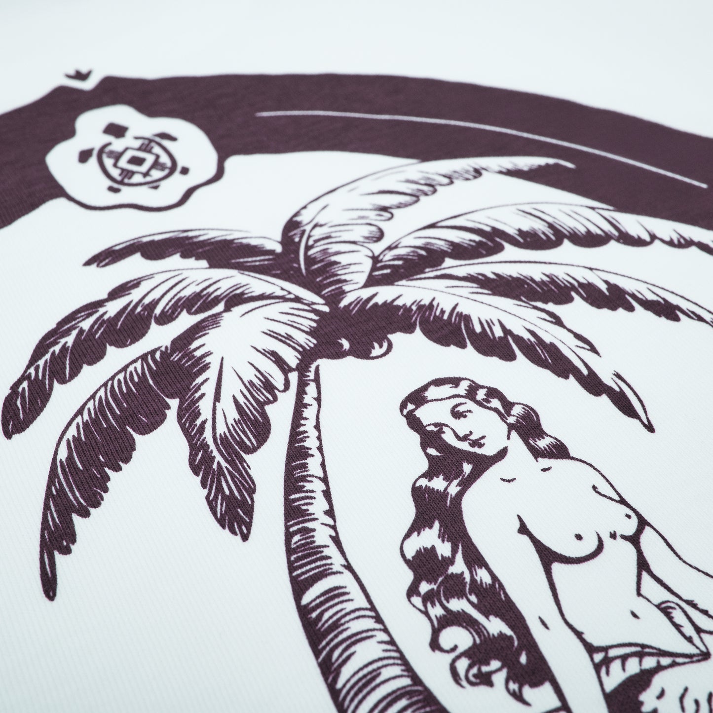 Illustration of a woman by a palm tree with a logo in the corner