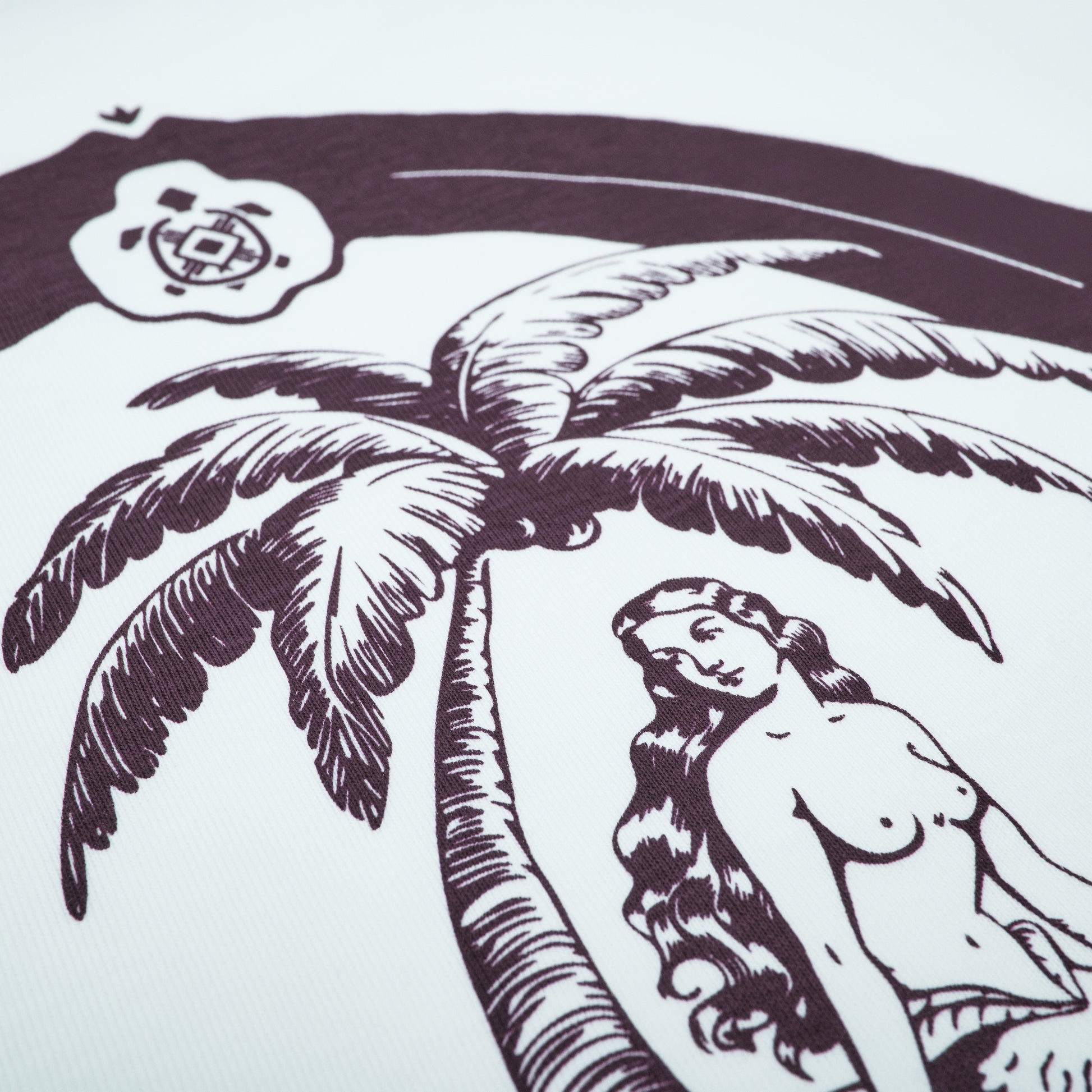 Illustration of a woman by a palm tree with a logo in the corner